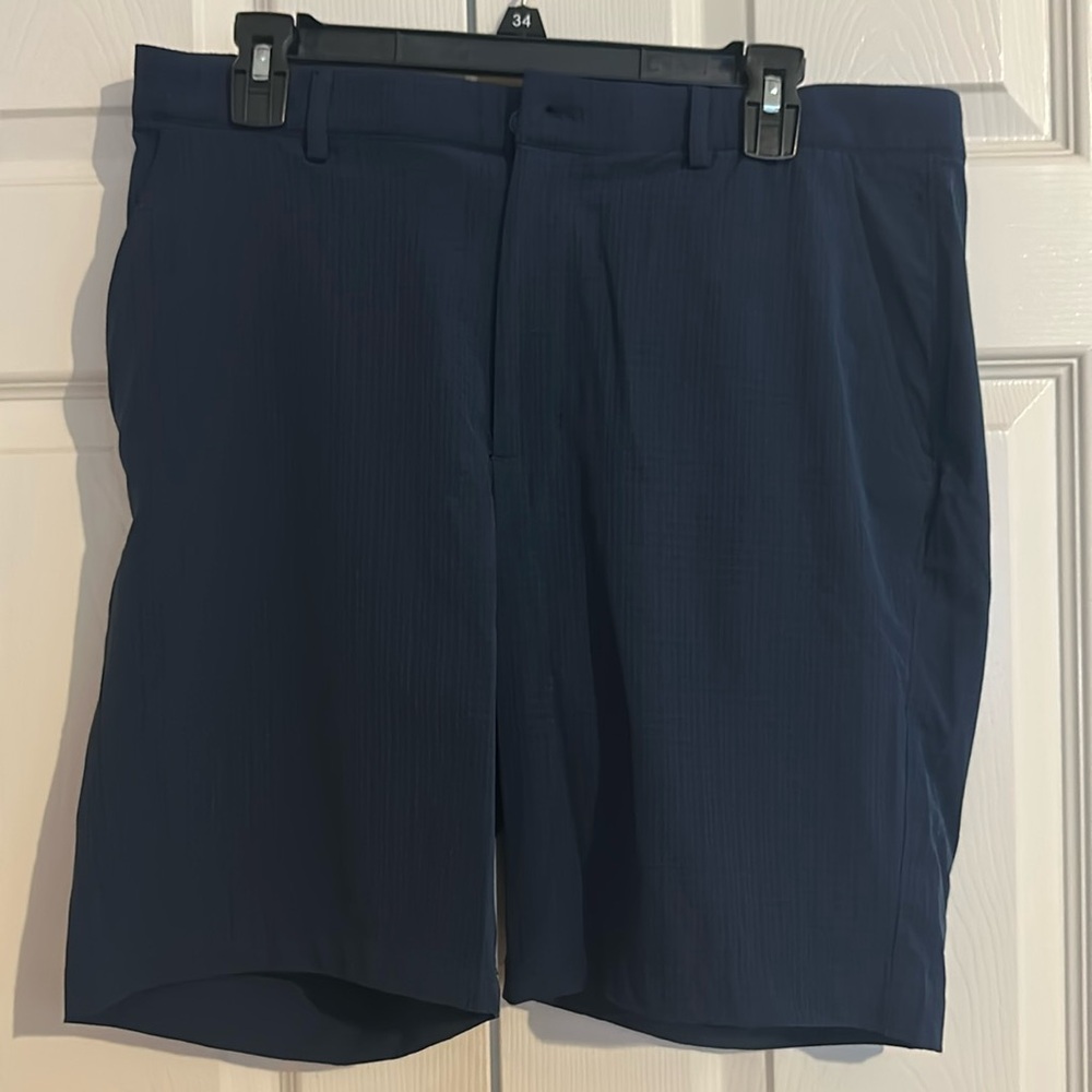 Men’s Greg Norman Golf blue‎ golf shorts size 34